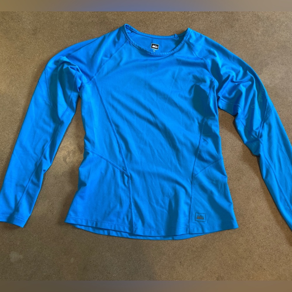 REI brand long sleeve workout shirt/base layer, size XS, color blue.